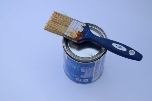 can and brush for office painting